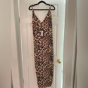Brand new rebdolls dress. Runs big. Up to a 4x can fit.